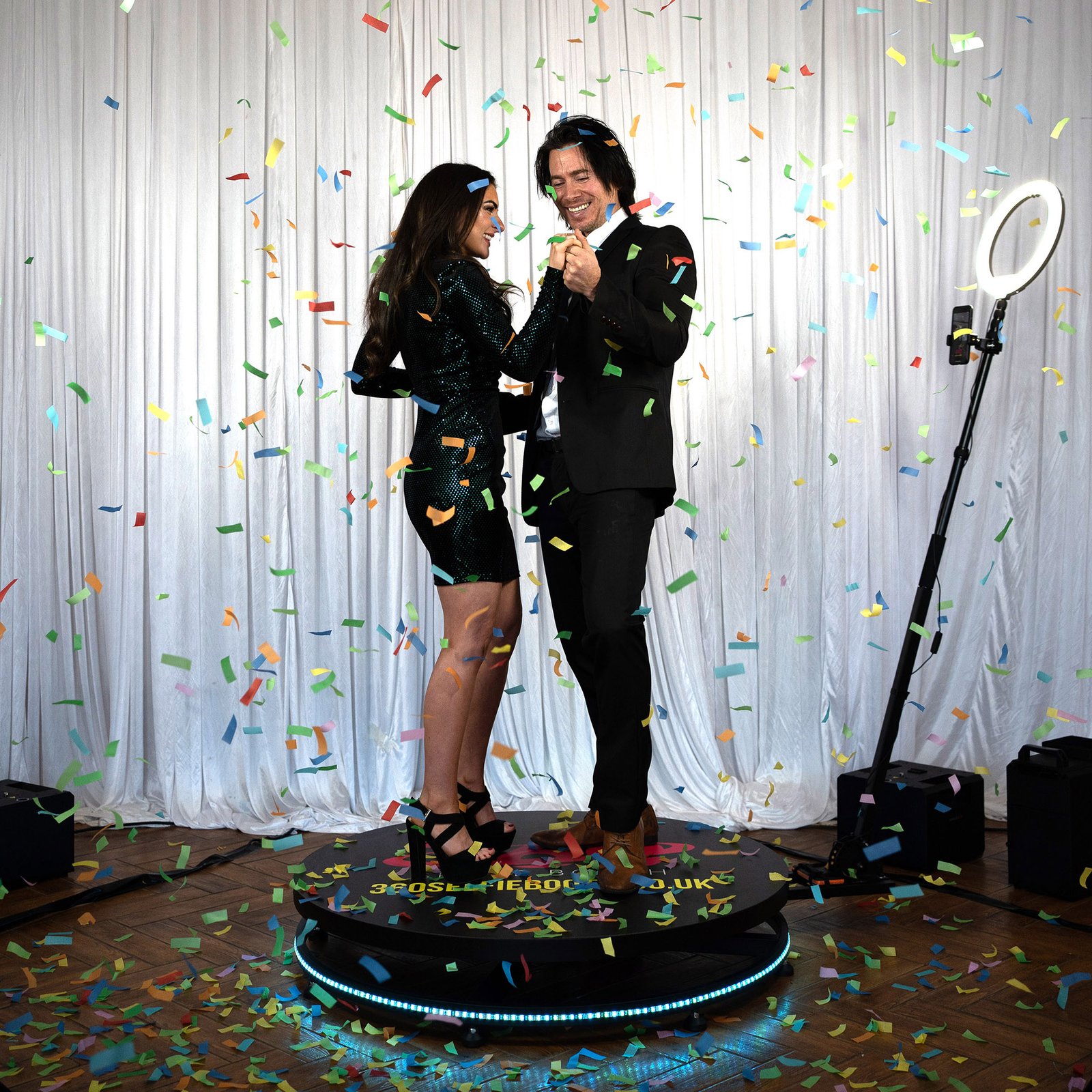 a couple on a 360 photo booth in vancouver
