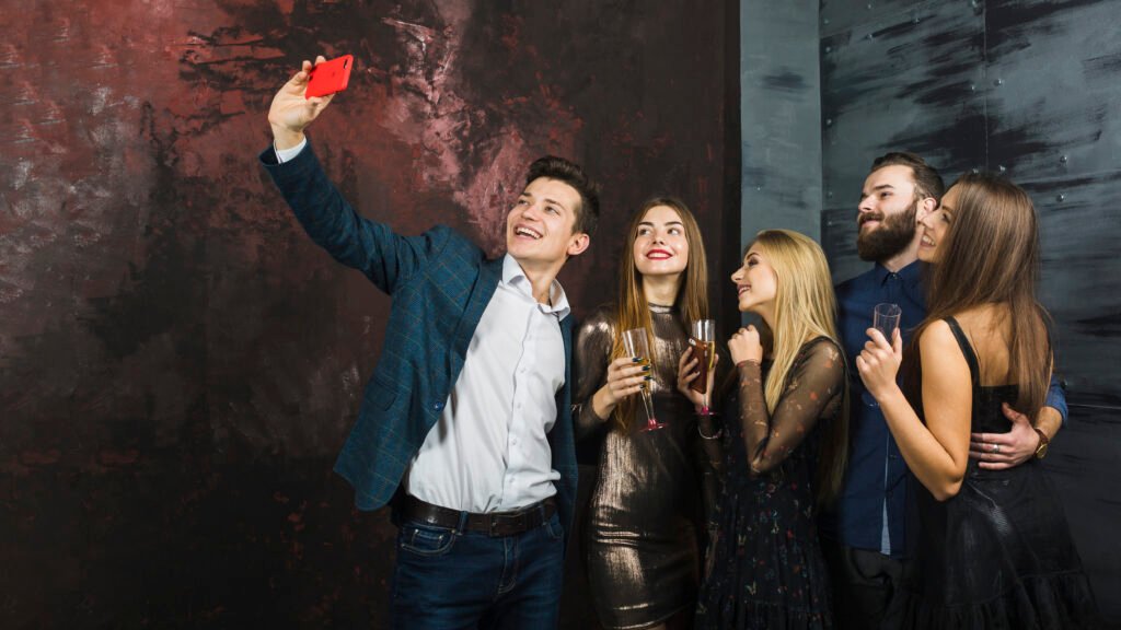 friends taking selfie new year party