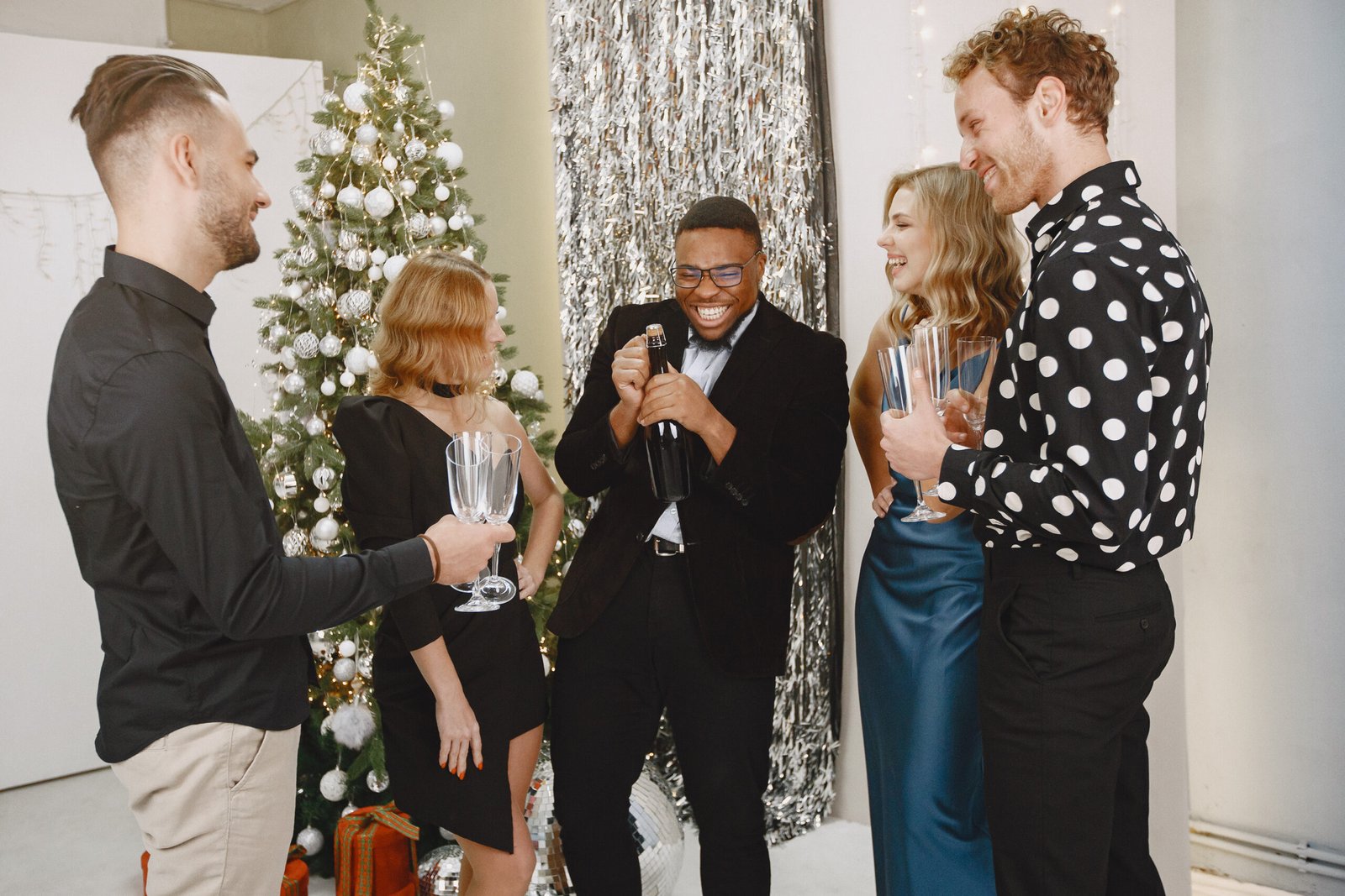 group young people celebrating new year friends drinks champagne